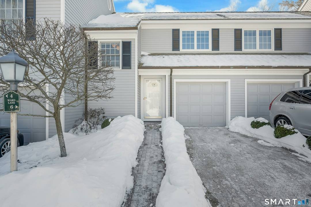 Townhouse style condo in the desirable Villager Pond community offering a prime Darien location and thoughtful updates.