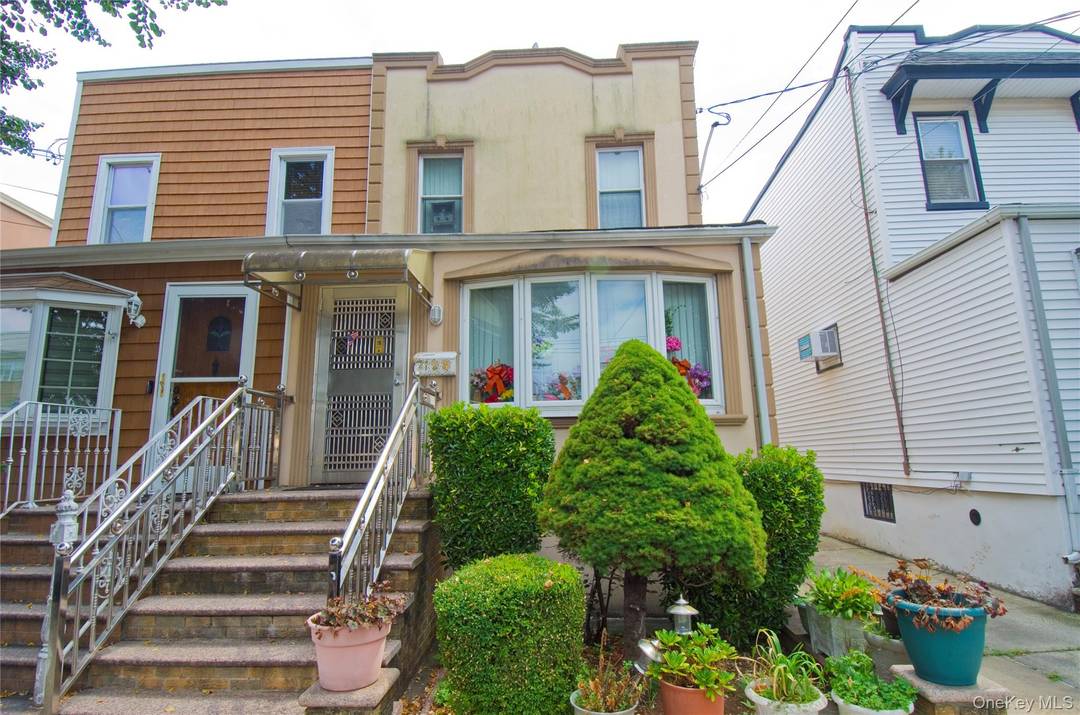 Beautiful 1 Family semi attached with 3 bedrooms, updated kitchen with granite counters, 2 and1 2 baths and finished basement.