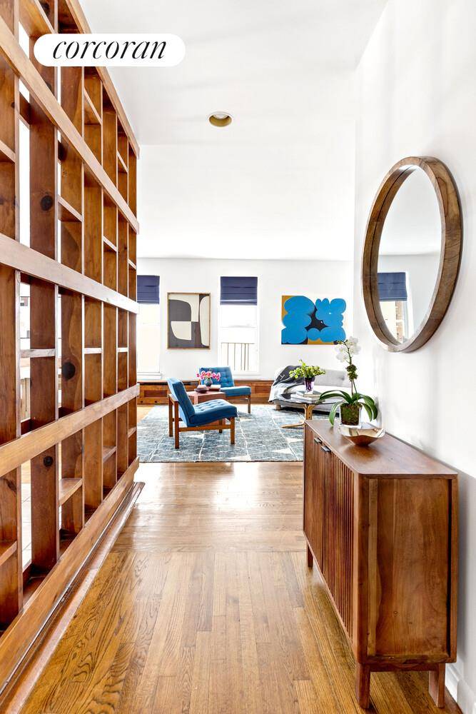 Welcome to 129 Columbia Heights, Apartment 63 A Rare Top Floor Gem in Brooklyn Heights Perched on the top floor of a stately Beaux Arts co op, this corner three ...
