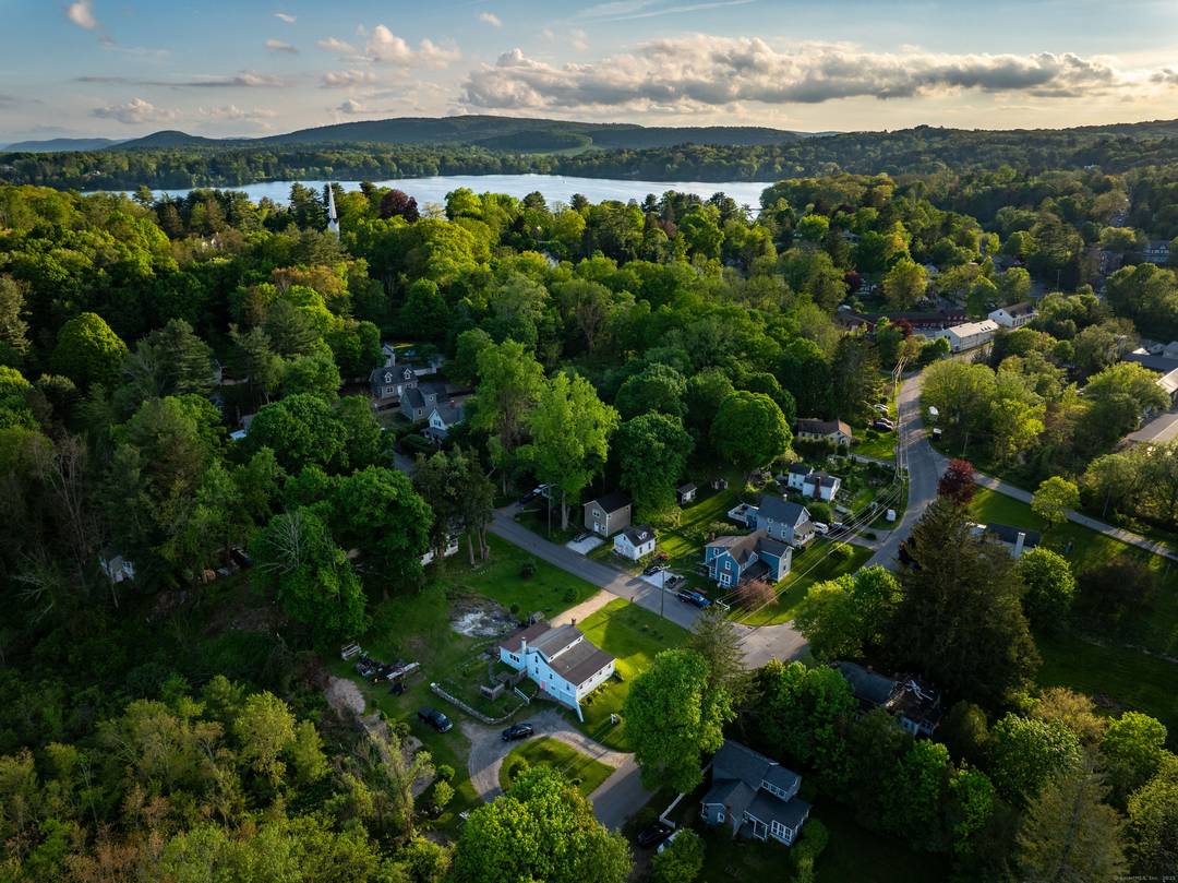 Beautifully maintained four bedroom home with two full baths located on the corner of Perry Street and Farnum Road, just a short distance to Lake Wononscopomuc and downtown Lakeville.