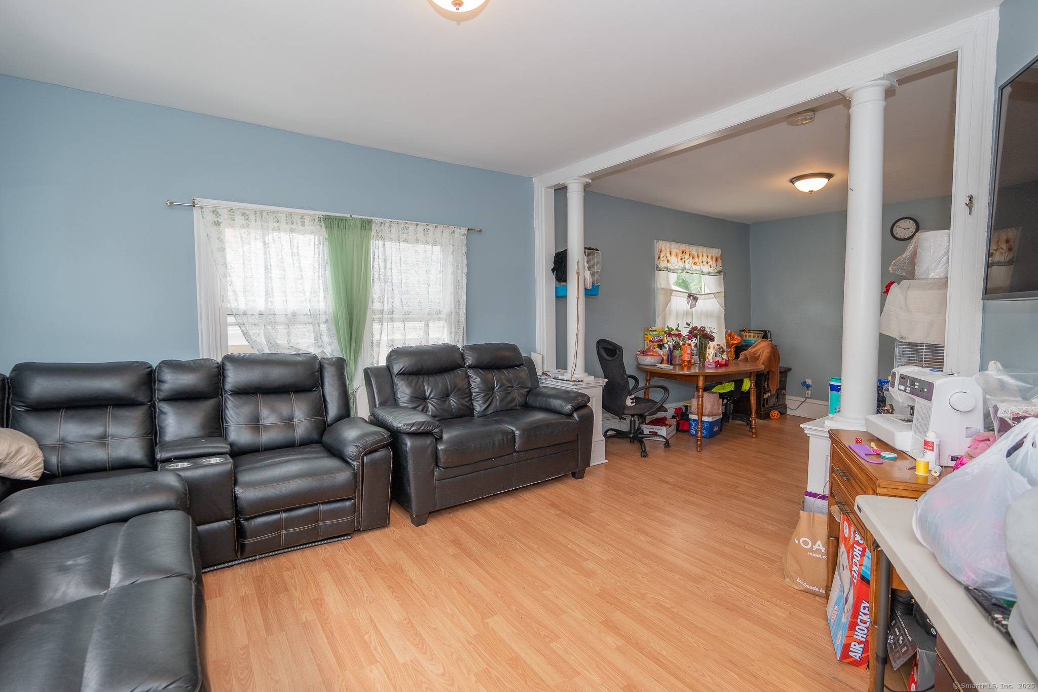 This spacious 3 Family Home offers an excellent investment opportunity, featuring three units each with three bedrooms, a double living room, a kitchen, and beautiful hardwood floors.