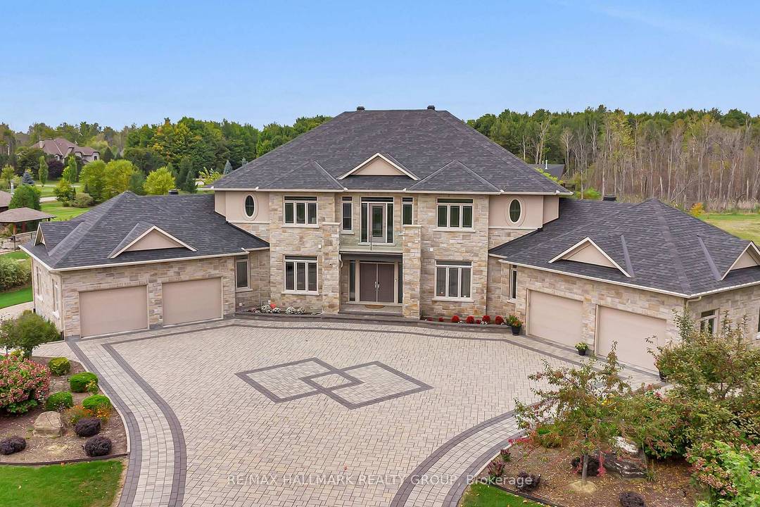 Welcome to this extraordinary estate in the prestigious Rideau Forest community of Manotick.