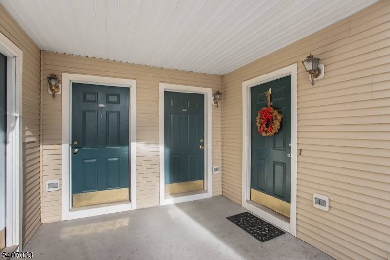 Freshly painted and move in ready, this clean and bright townhome offers an open floor plan, hardwood floors, and a cozy fireplace.