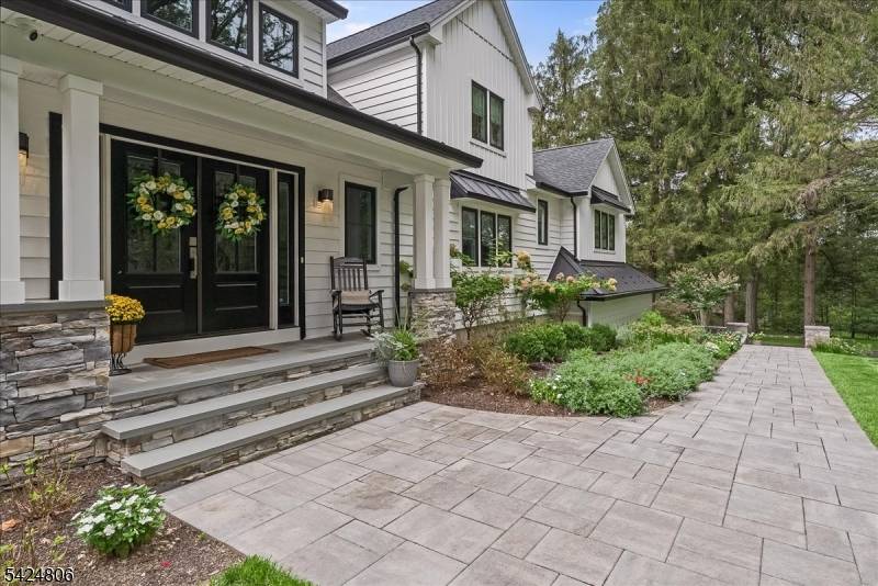 Set on just under 2 acres in one of Denville's most convenient locations, this property offers a rare balance of privacy and proximity tucked away, yet moments to everything.