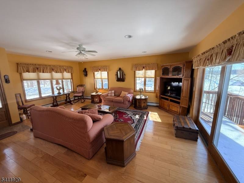Spectacular Lake Views from nearly every angle in this beautifully positioned home in Upper Greenwood Lake.