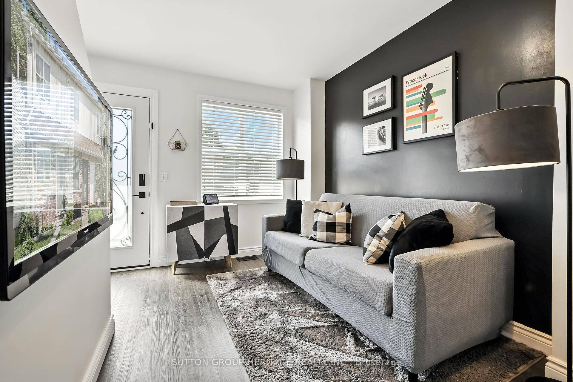Nestled amongst the historic and charming Victorian row houses sits 152 Olive Avenue.