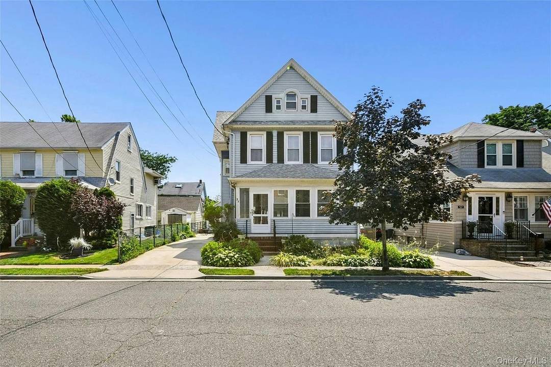 Welcome to this beautifully renovated second and third floor apartment located at 55 Vernon Ave, Rockville Centre !