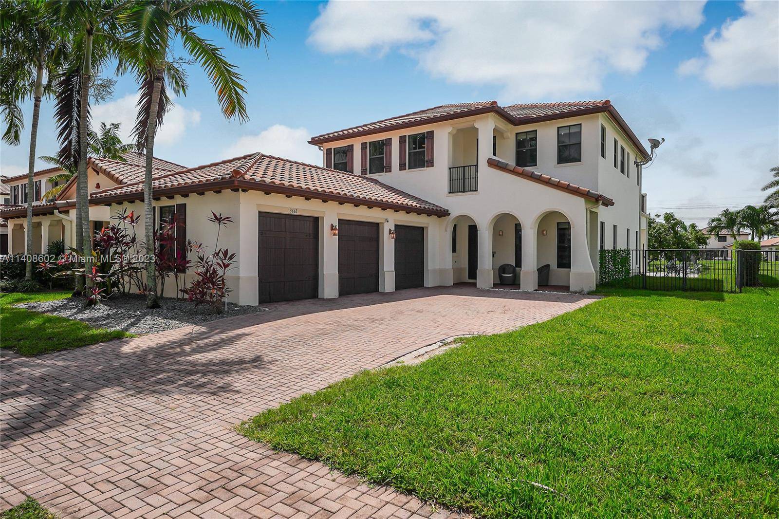Welcome to your dream lakefront property located at 3661 NW 85 Ter, Cooper City, Florida.