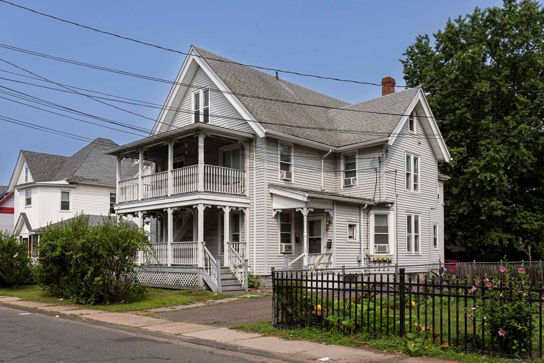 Well maintained 4 family house with plenty of off street parking.