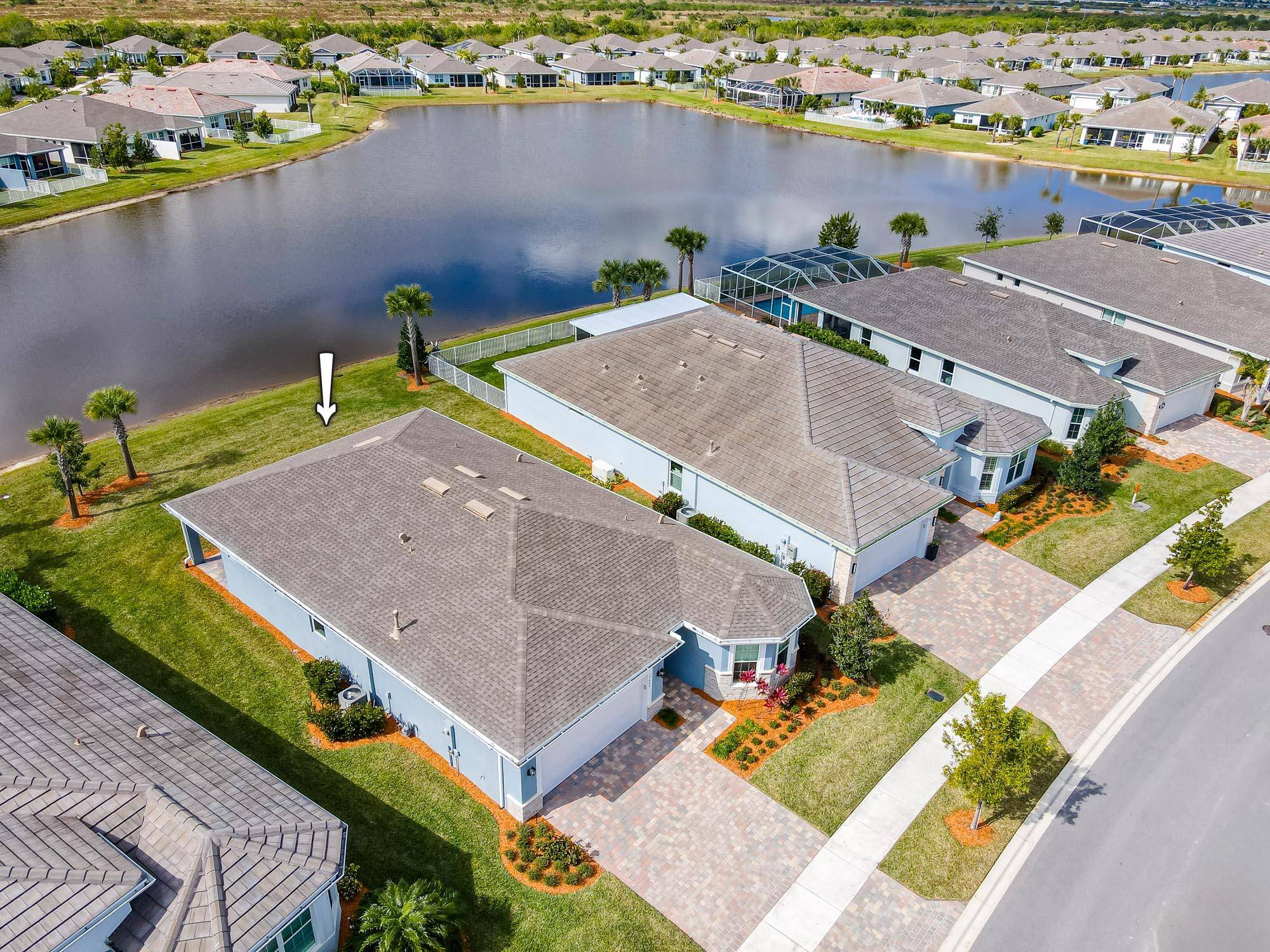 Step into this almost new meticulously maintained lakefront home in the highly sought after 55 community of Del Webb.
