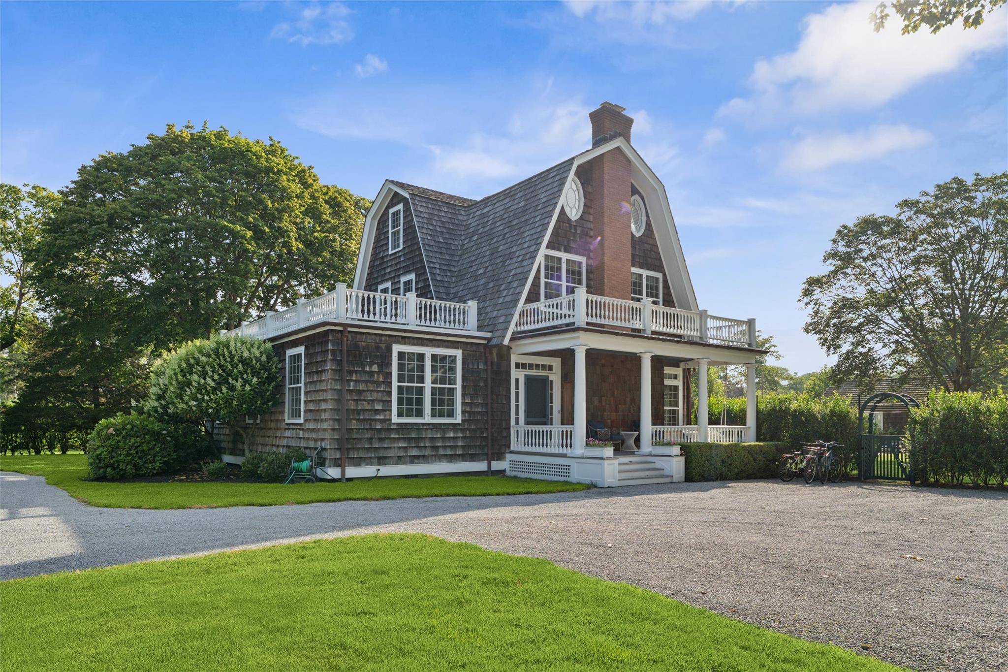 QUOGUE SOUTH ESTATE RENTAL Centrally located in the heart of Quogue's estate section, this elegant residence has just undergone a complete high end renovation.