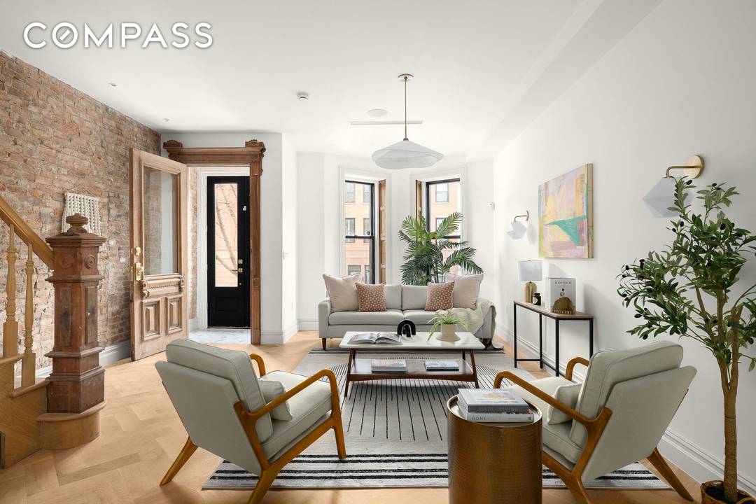 Welcome to 485 Halsey Street, a meticulously renovated 1899 townhouse that seamlessly blends timeless architectural character with refined modern living.