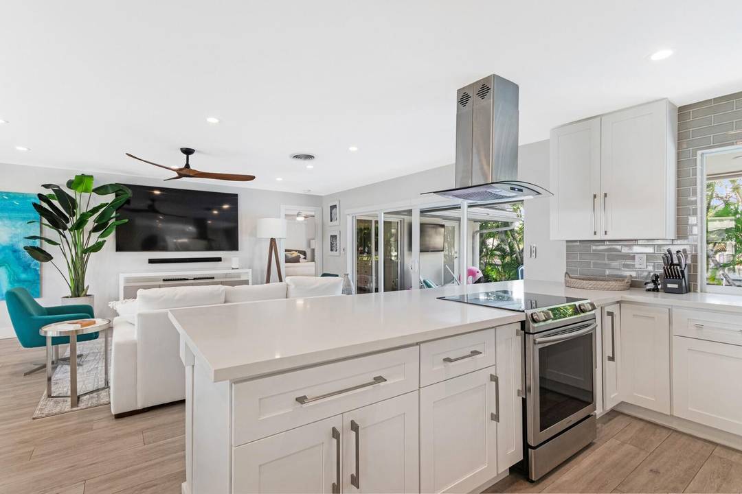 Experience refined waterfront living in this beautifully updated 3 bedroom, 3 bath home in Coral Ridge Isles.