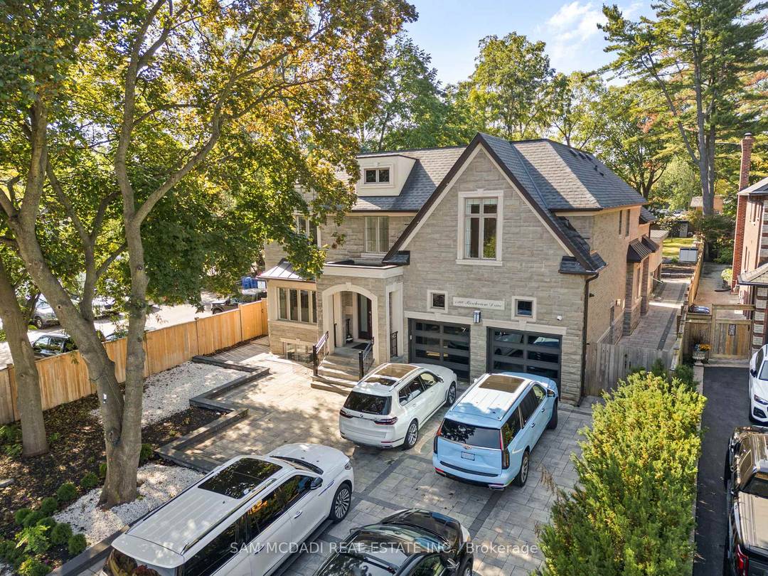 This distinguished residence sits quietly on one of Lorne Park's most desirable streets, surrounded by mature trees and a true sense of privacy.