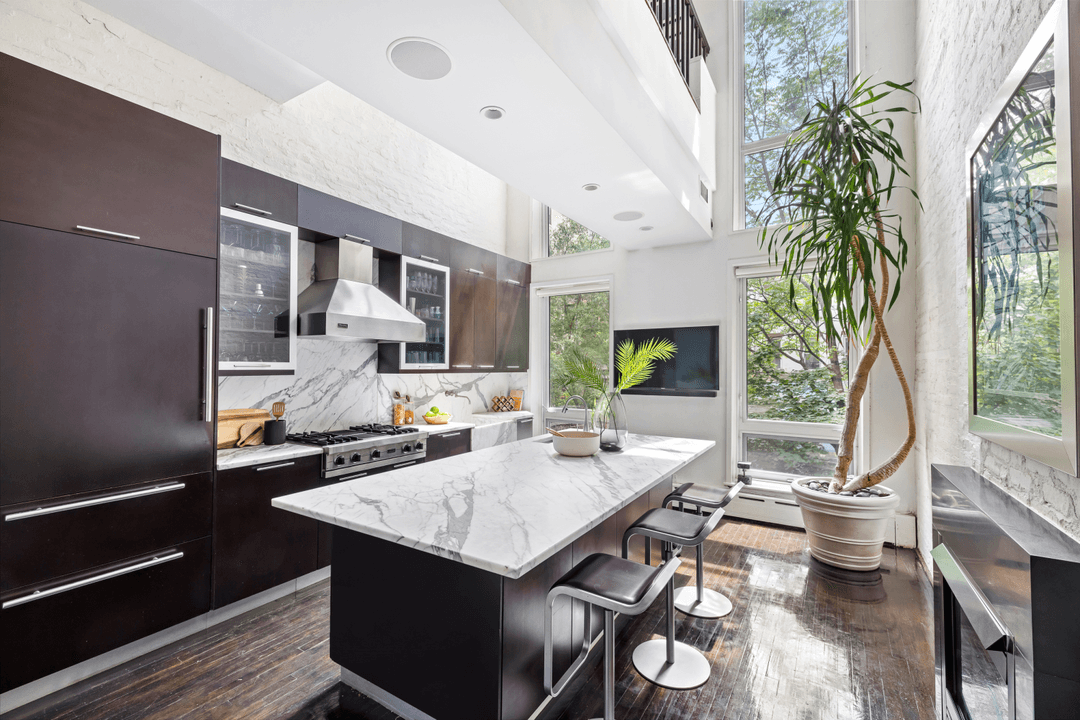 In the heart of Chelsea's vibrant gallery district, where the High Line meets the iconic Hotel Chelsea, an extraordinary townhouse opportunity emerges.