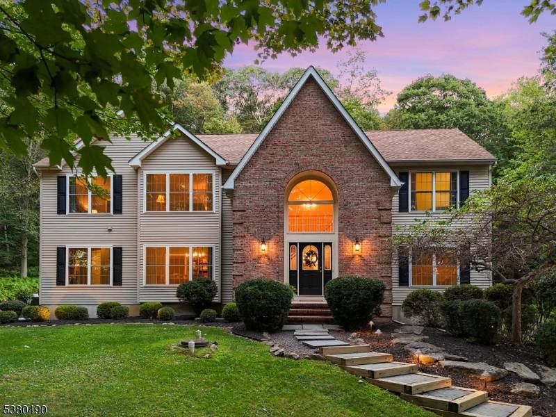 Experience the perfect blend of natural beauty and modern comfort at 30 Squire Hill Rd, nestled in the desirable Squire Hill neighborhood of Long Valley, NJ.