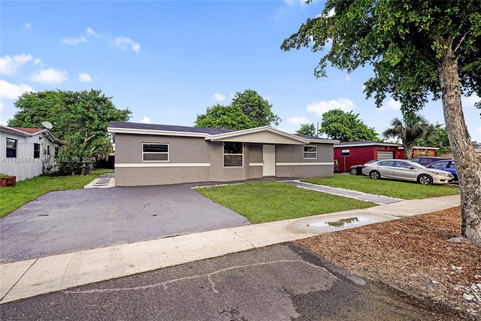 Discover the potential of this well maintained home located in a quiet neighborhood in Lauderdale Lakes.