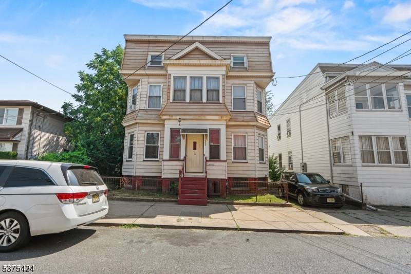 Income producing 4 family property in the heart of Haledon !