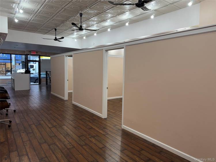 Great busy location in the heart of Greenpoint business district surrounded by Anchor commercial tenants next to Walgreen's pharmacy.