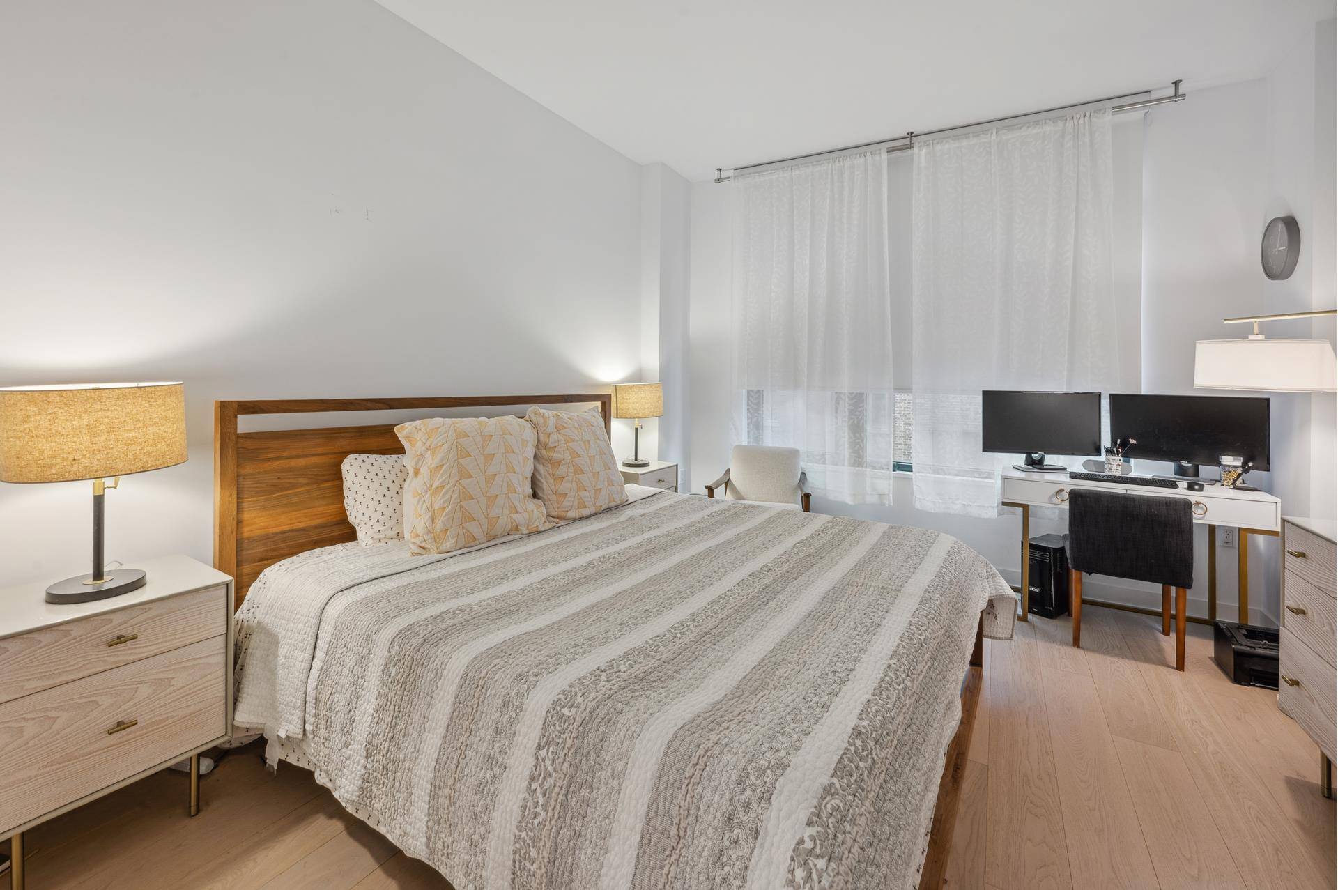 Spacious two bedroom, two bath w 108 sf balcony, oversized windows, 6 wide European white oak flooring throughout, high efficiency central heating and cooling, and a Bosch washer and dryer.