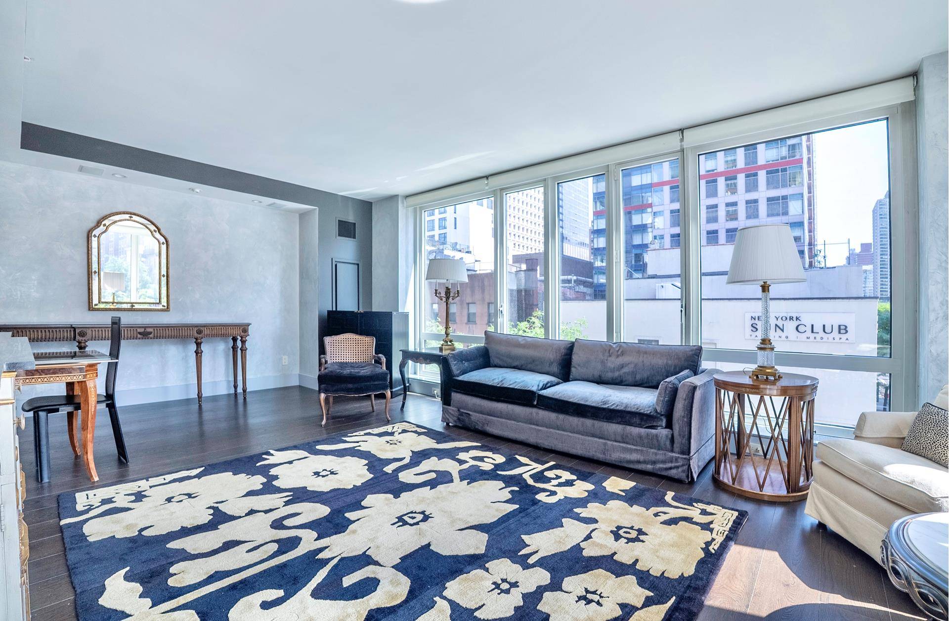 Situated on the coveted sun drenched northeast corner of 250 East 53rd Street, this superbly designed and spacious two bedroom, two and a half bathroom home has it all.