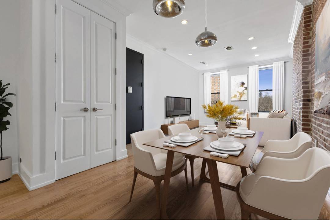 Experience luxurious penthouse living in an elegant boutique brownstone at 506 East 119th Street.
