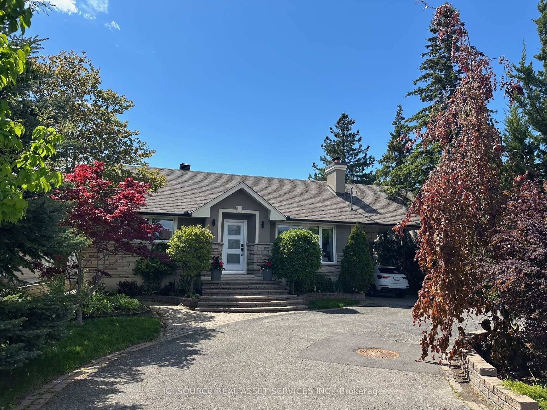 LOCATION ! This 3 1 bedroom bungalow has gleaming hardwood throughout, crown molding, pot lights, large main floor family room, renovated kitchen with waterfall counters and stone accent wall, gas ...