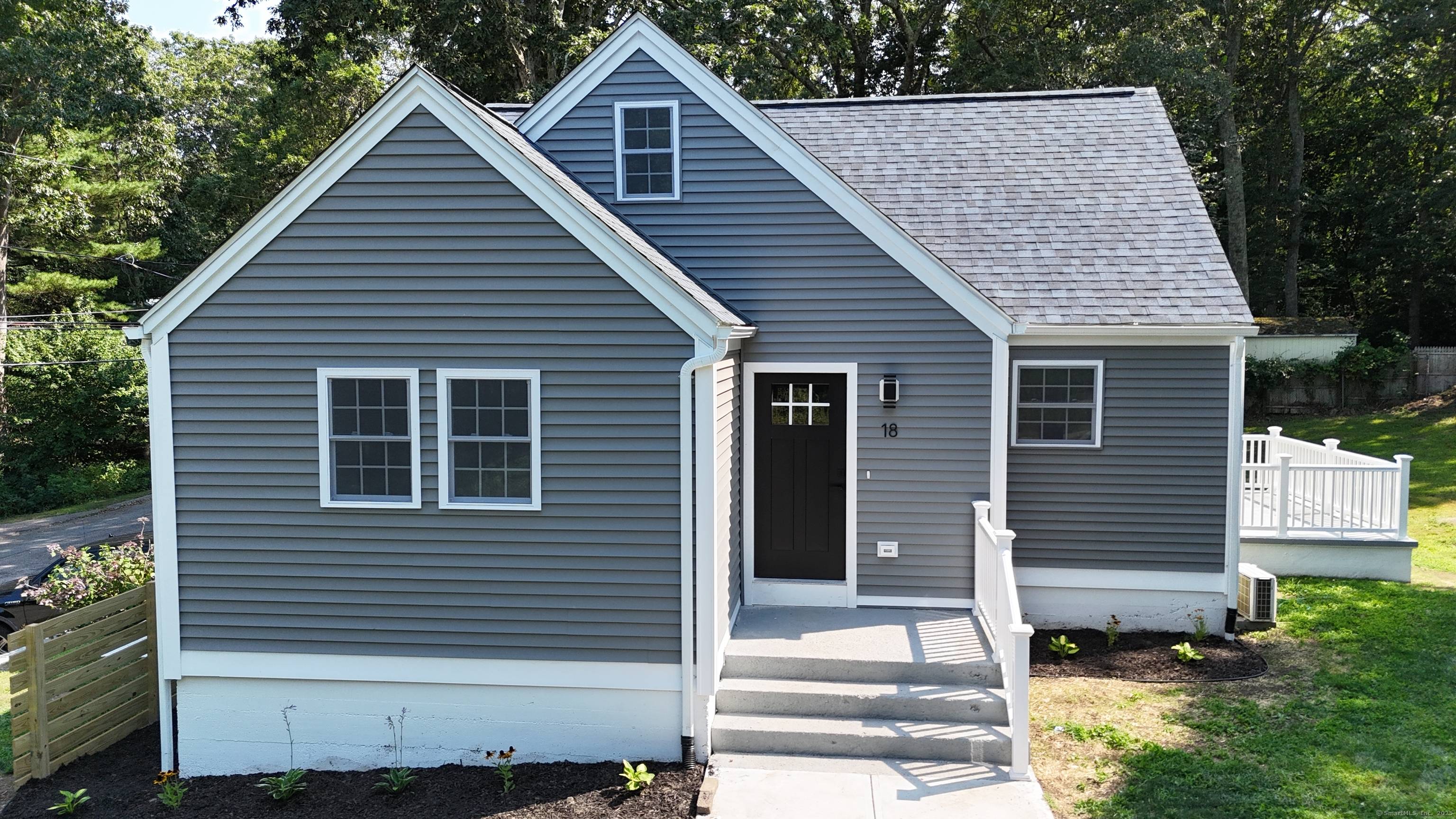 Welcome to 18 Burdick Lane in Pawcatuck, Connecticut a fully renovated home combining modern updates with timeless New England charm.