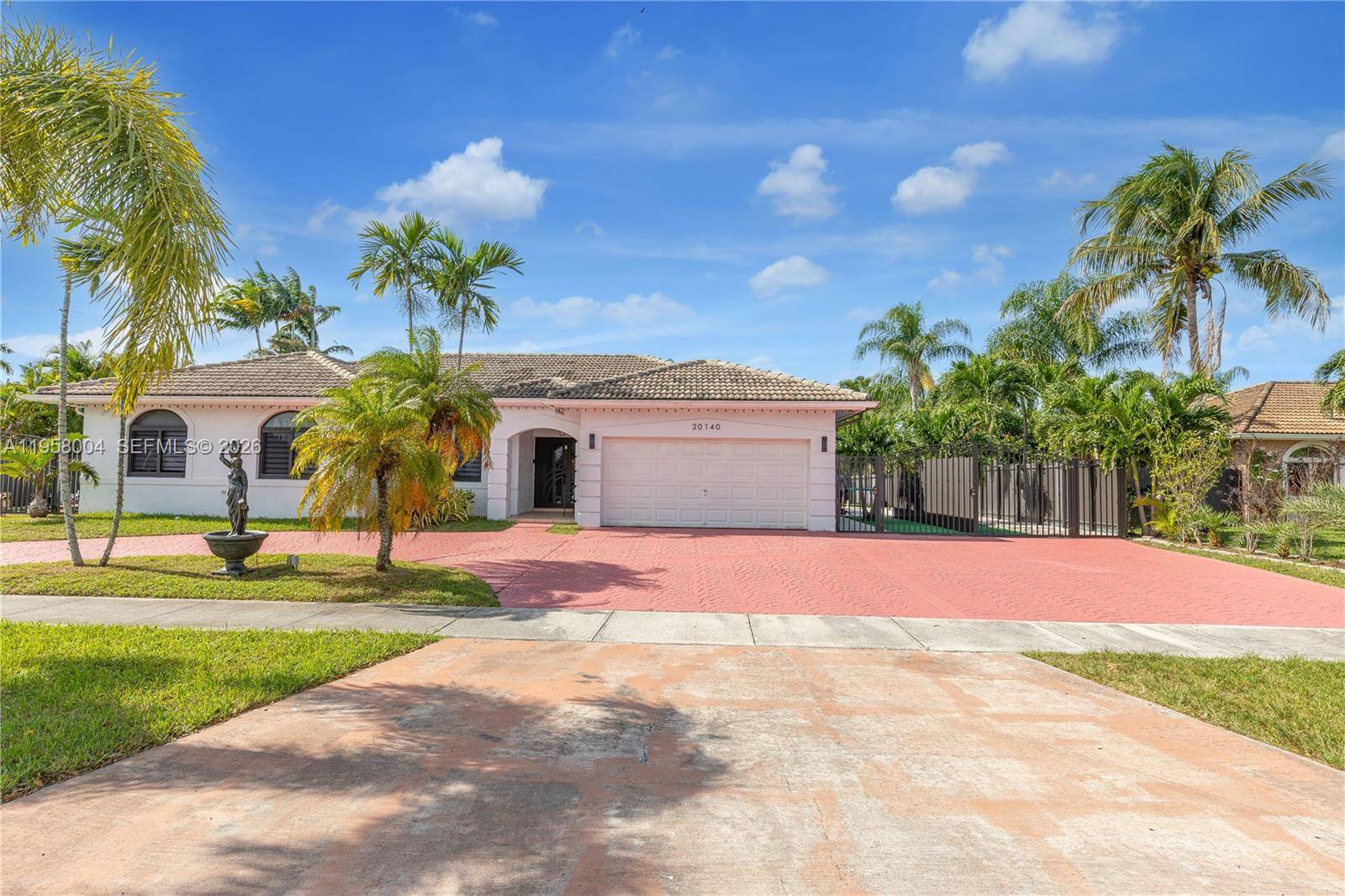 Amazing home featuring a private pool and spacious backyard with a basketball court, pergola, and children s play area fun and entertaining patio.