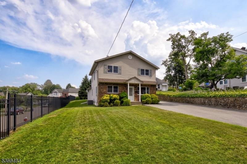 This stunning 5 bedroom, 3 bath Colonial offers spacious living and exceptional versatility.