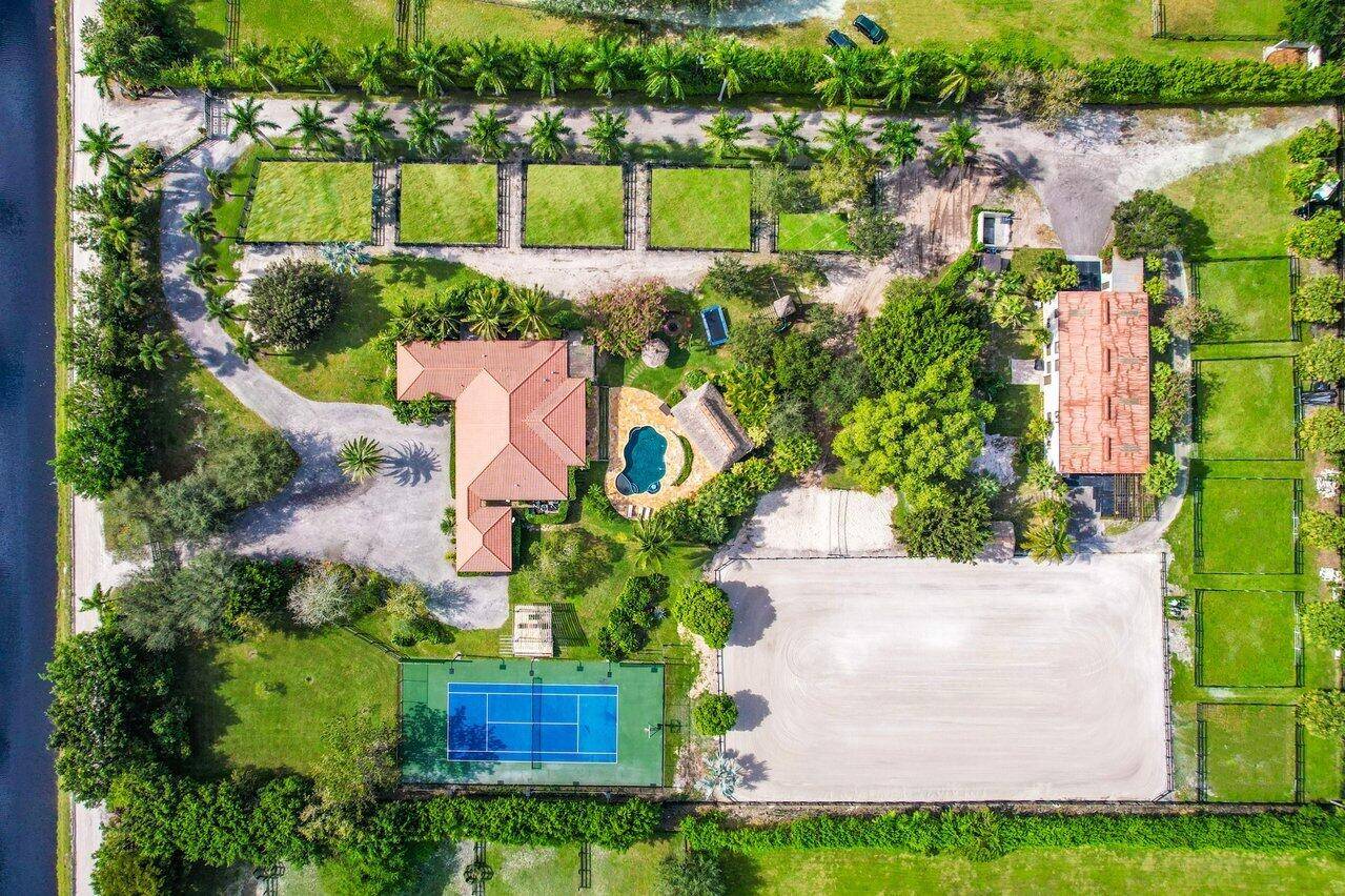 A Peacefully Situated Farm in Wellington A 2007 Custom built home of 4, 342 square feet per county, nice open split plan with spacious 4 bedrooms, 3 bathrooms.