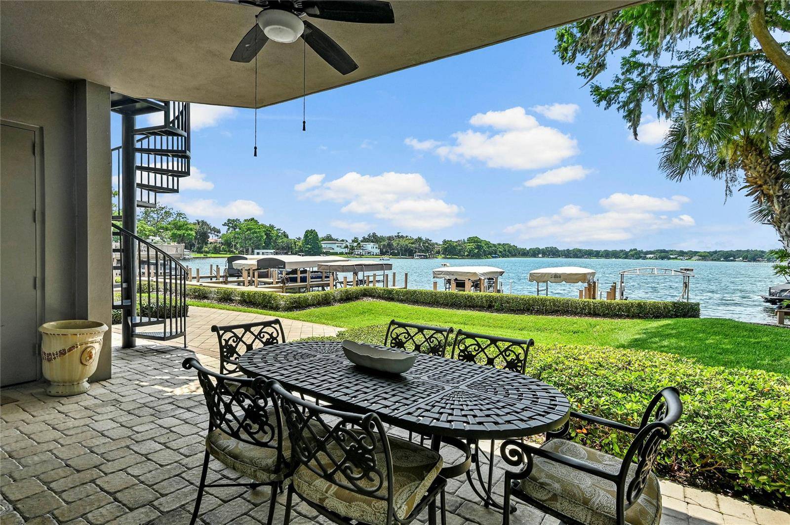 Experience the best of Winter Park waterfront living in this beautifully updated ground floor residence at Perle du Lac, ideally located just a short stroll from the boutiques, restaurants, and ...
