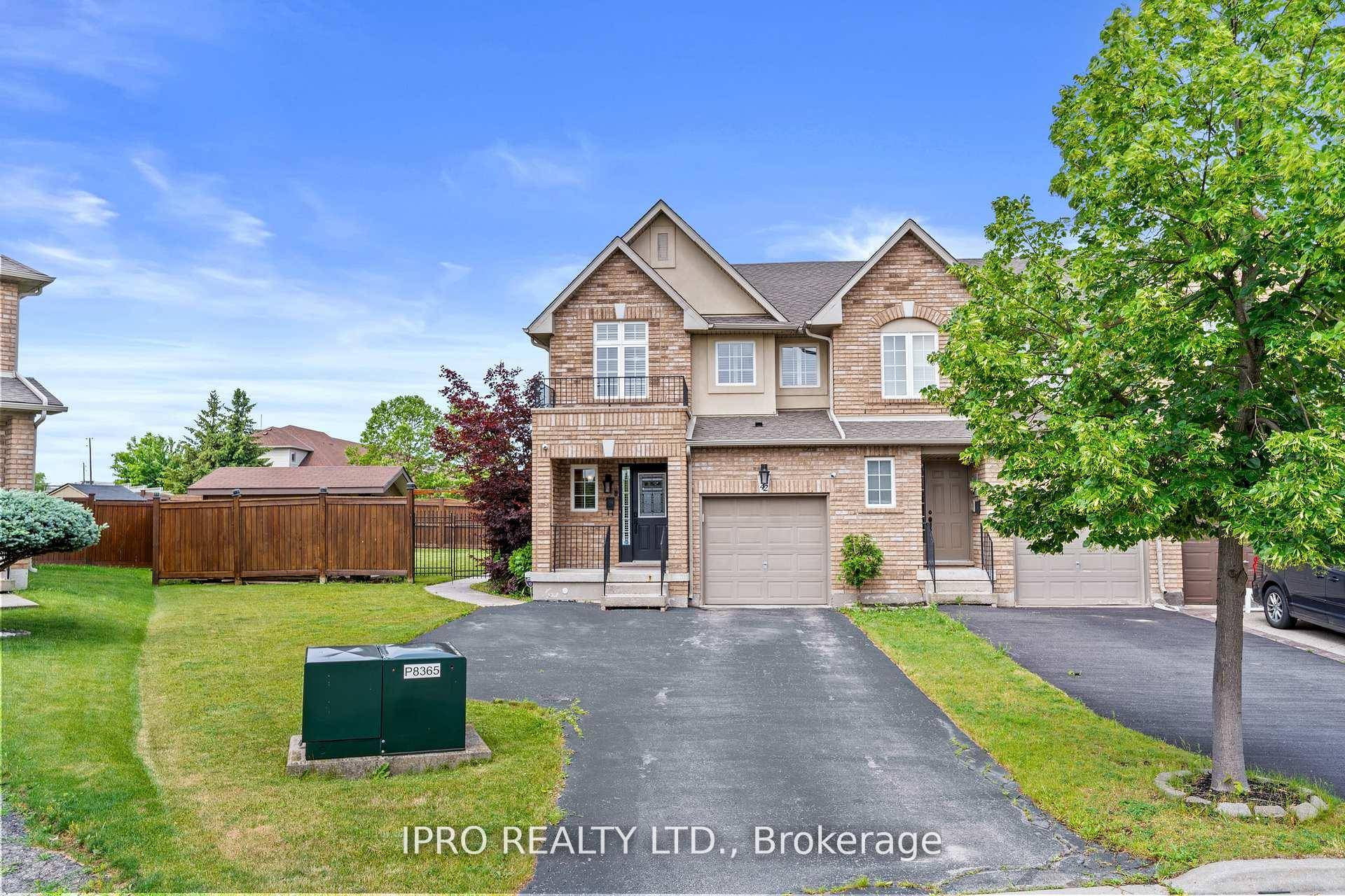 Welcome to this beautifully maintained rare corner freehold townhouse offering 2, 000 sq.