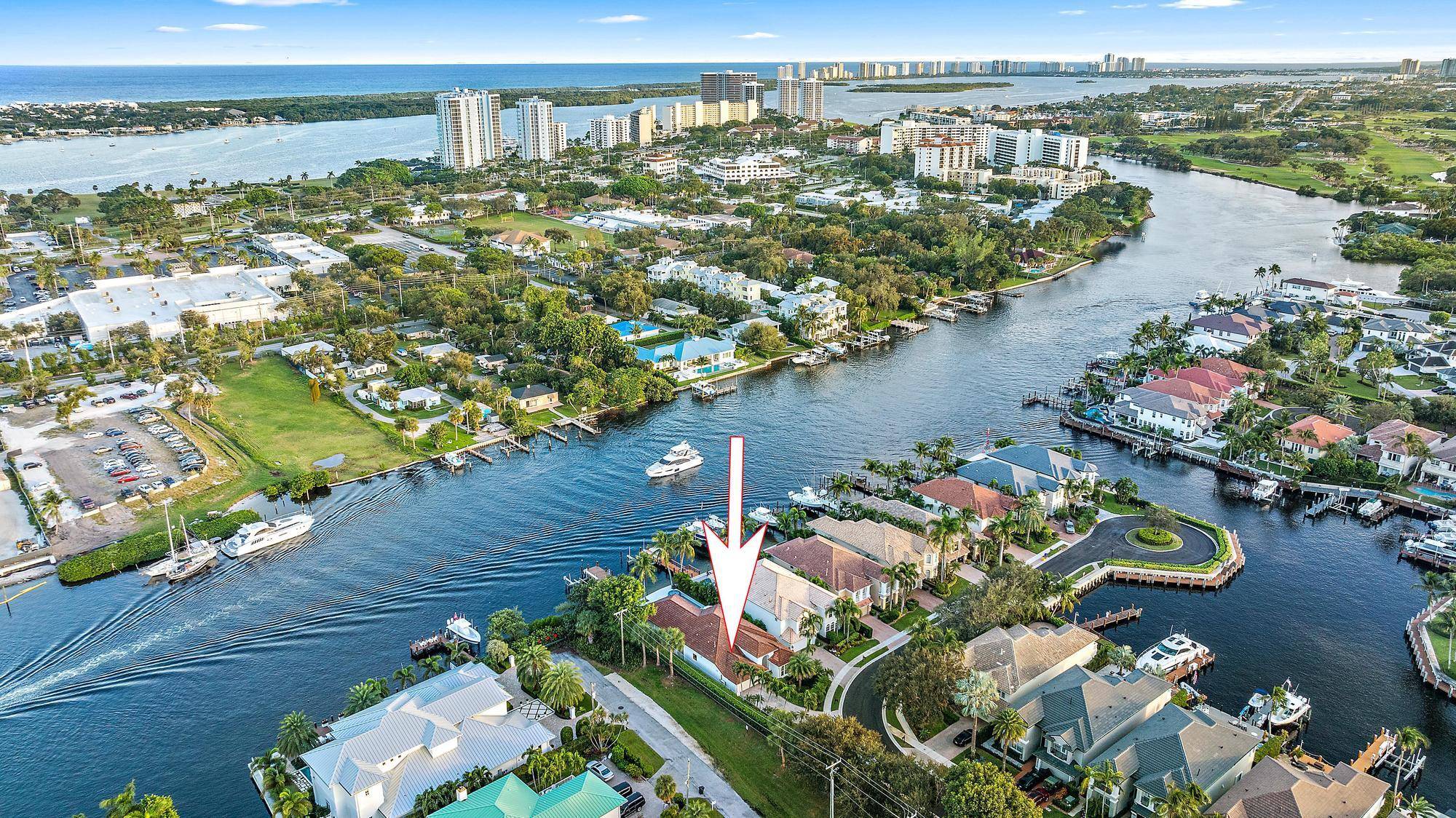 Timeless Waterfront Elegance located in the prestigious community of Prosperity Harbor in North Palm Beach.