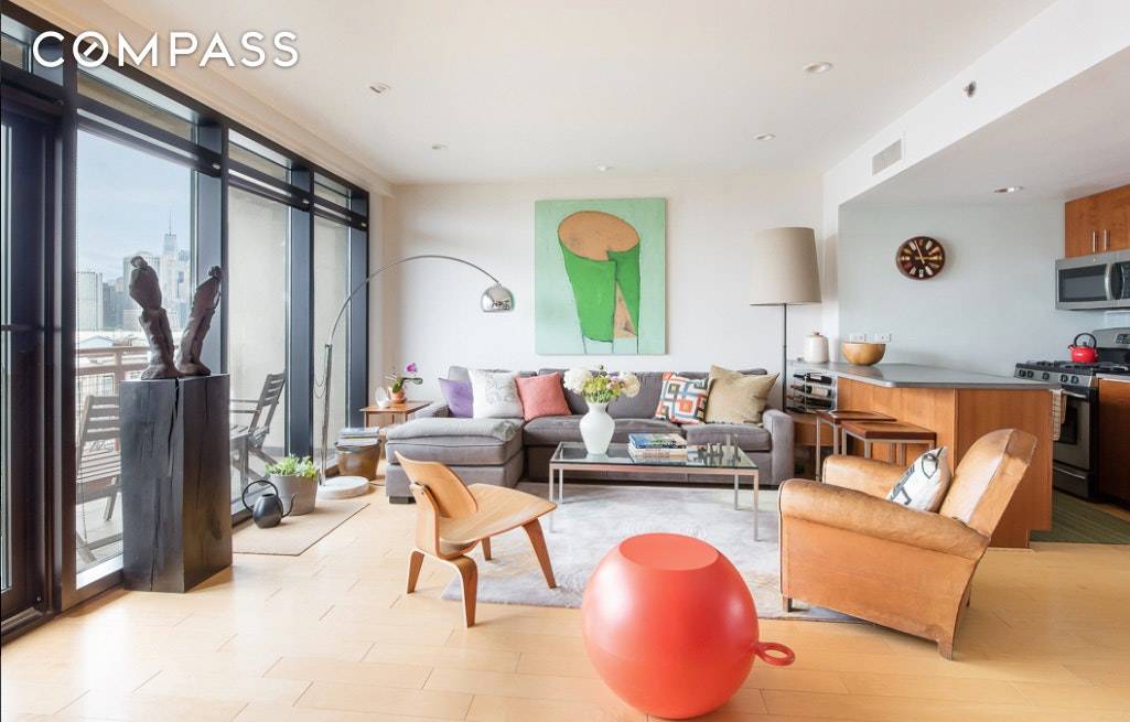 An exceptional 2 bedroom, 2 bathroom condominium with GATED PARKING and incredible views of New York Harbor and Manhattan.