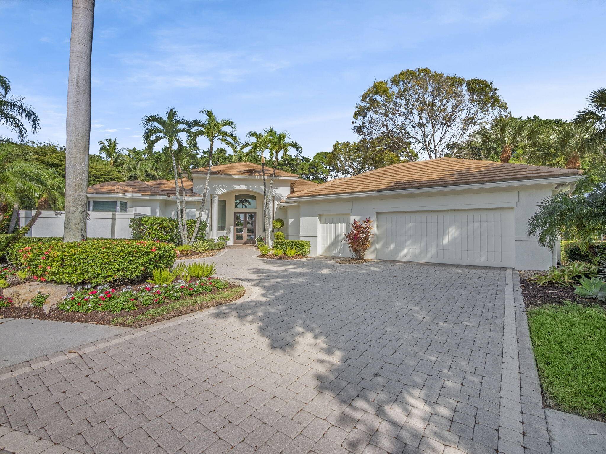 PRIVATELY SET ON NEARLY HALF AN ACRE OF LAND AT THE END OF A CUL DE SAC.