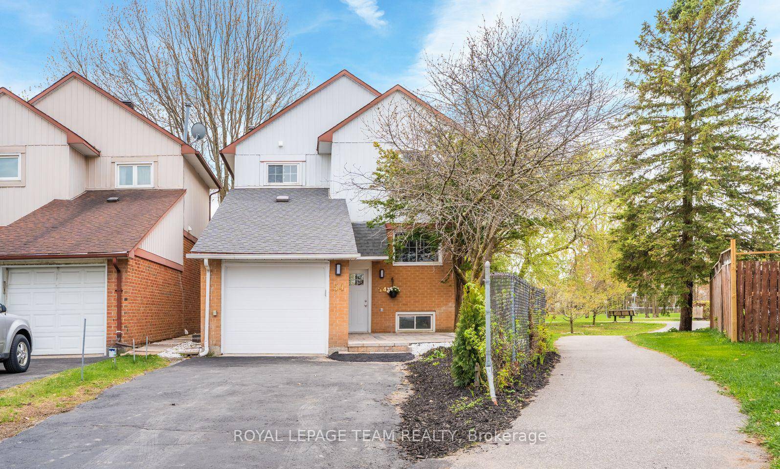 Located in the heart of Greenboro, this detached home sits on a unique oversized lot for this street, with direct access to nearby parks and trails.