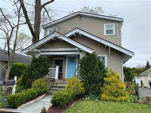Beautifully renovated four bedroom home in Darien on a quiet street with water views.
