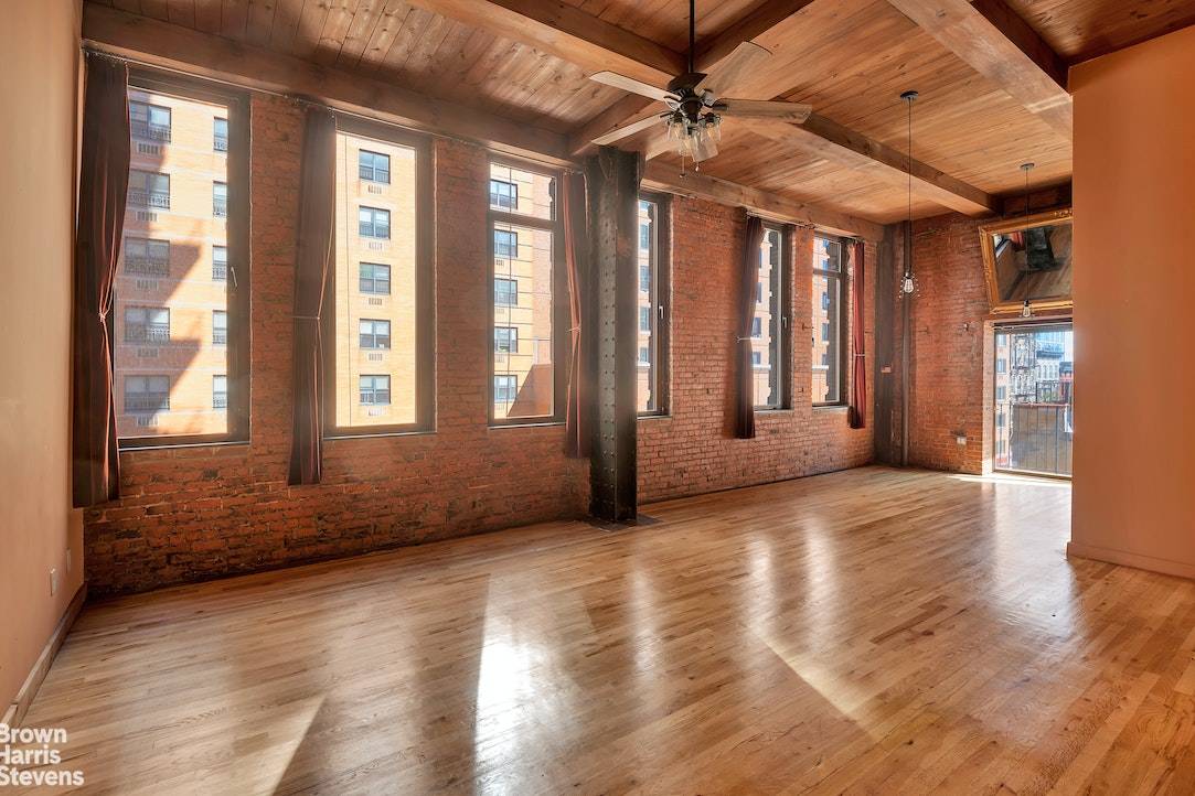 Oversized Condo Loft with Private Outdoor SpaceExperience a blend of classic charm and modern design in this recently remodeled loft boasting a myriad of exceptional features.