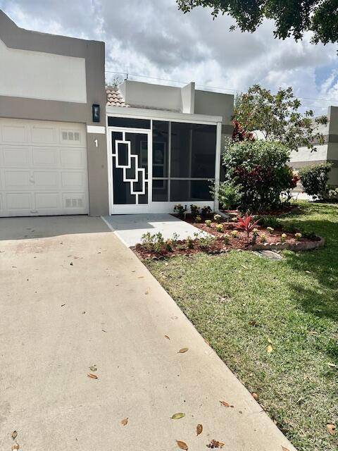 2 2 CORNER Villa, 1 car garage, front patio, updated kitchen, granite, stainless appliances, new wood look floor throughout, freshly painted, new hurricane impact windows, new front and back door, ...