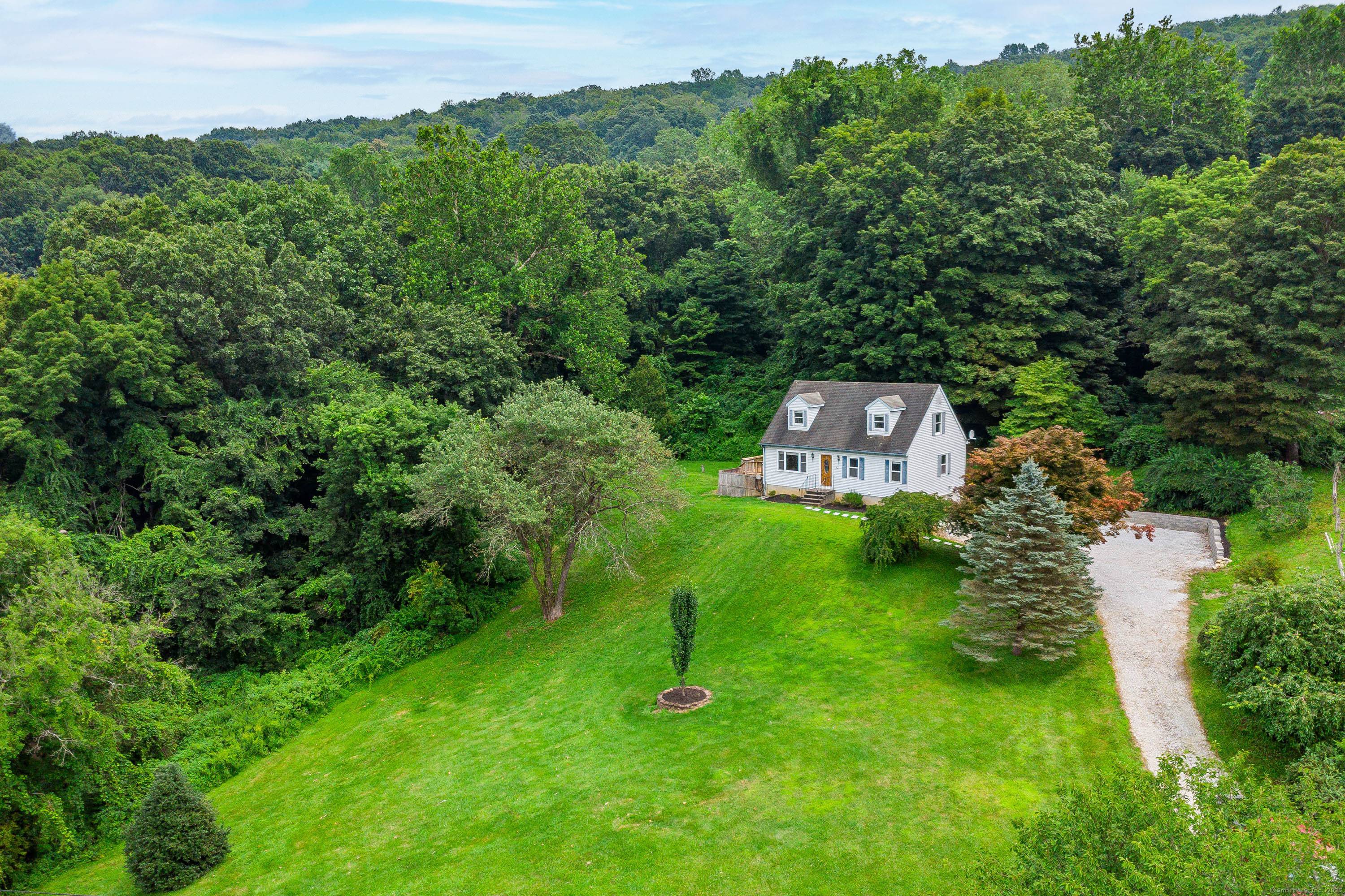 Welcome to 14 Heacock Crossbrook Rd in New Milford, CT a beautifully remodeled home offering comfort, efficiency, and rural charm.