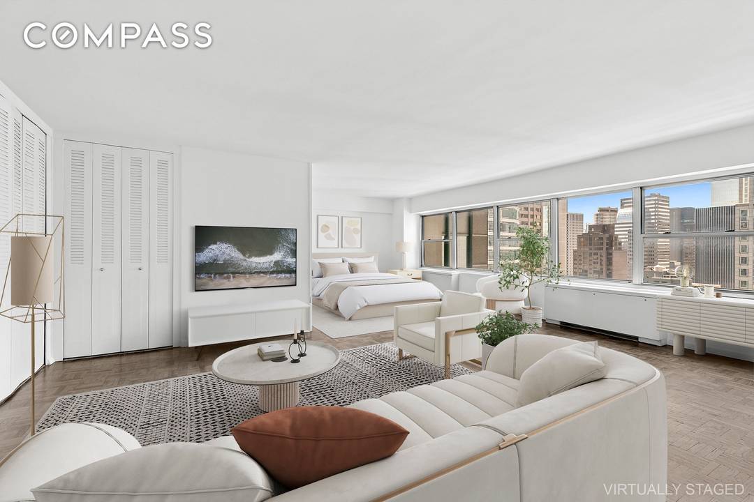 Step into this oversized, sun drenched loft like studio larger than many one bedrooms !