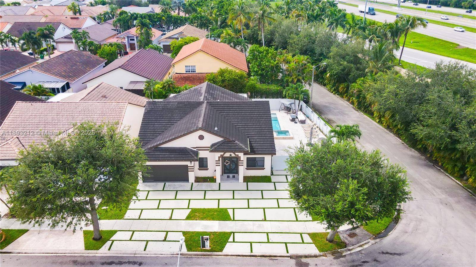 Welcome to your dream home in the heart of Miami Lakes !