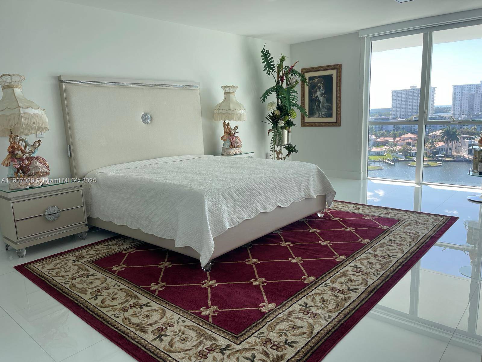 Step into a world luxury and elegance with this stunning 2 story condo offers million dollar views of Intracoastal, Oleta River Park and Ocean.