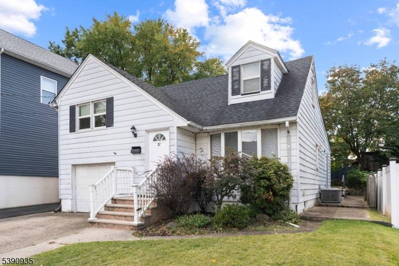 Beautifully maintained split level home in a prime Woodland Park location, close to shopping, dining, and major highways, including Rt.