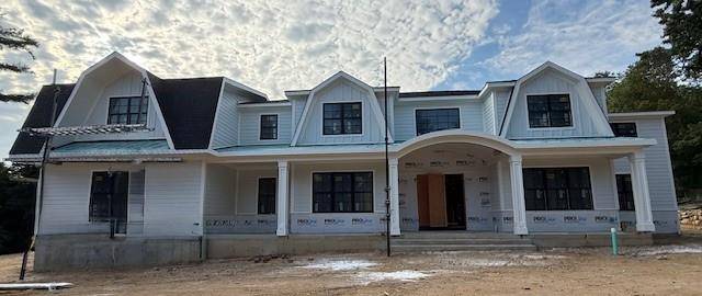 Welcome to this extraordinary Brand New Construction Hampton Style Colonial Home, nestled on two flat, beautifully landscaped acres in the prestigious Village of Lloyd Harbor !