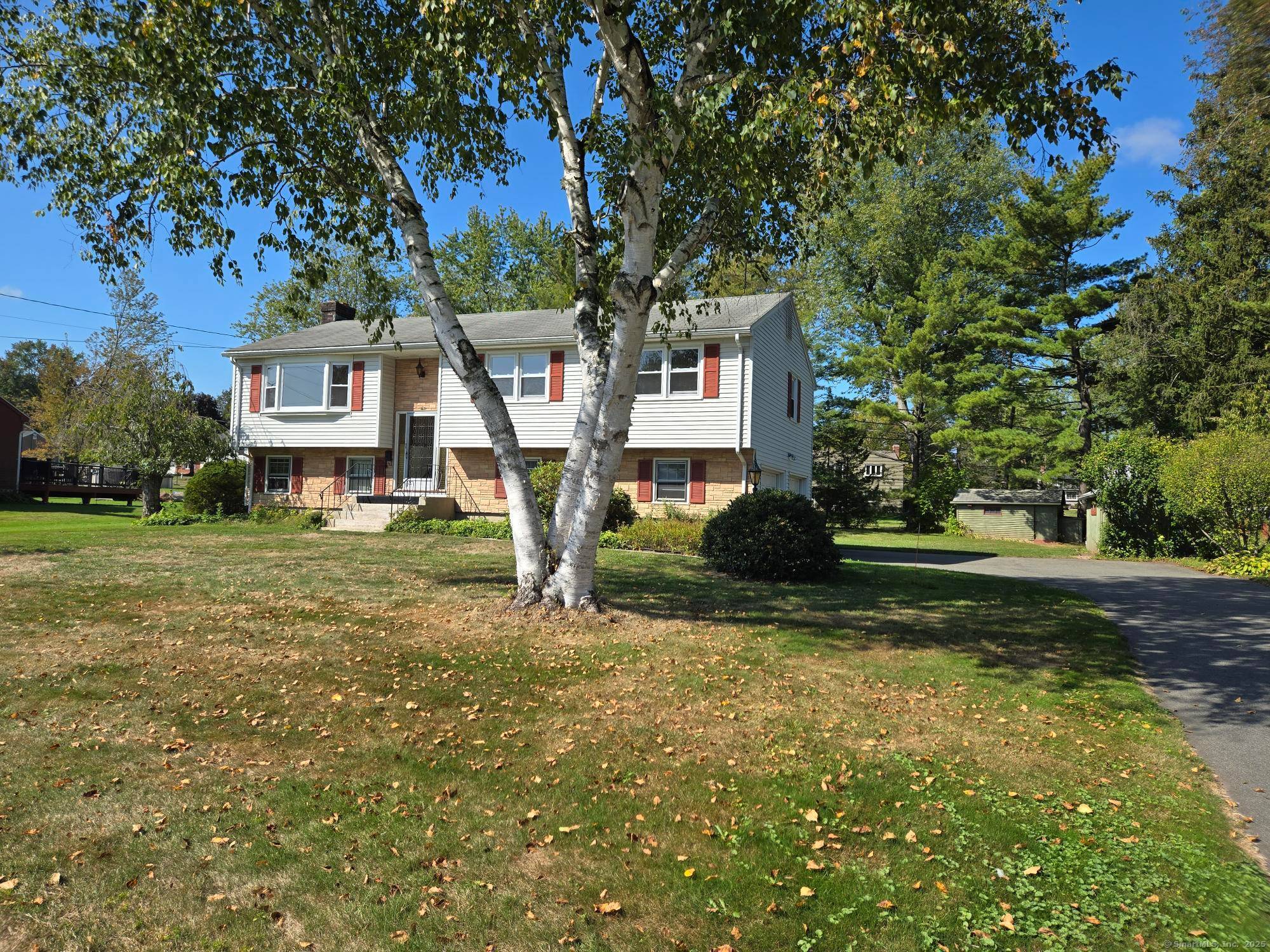 Welcome to this charming 3 bedroom Raised Ranch, perfectly situated on a peaceful street.