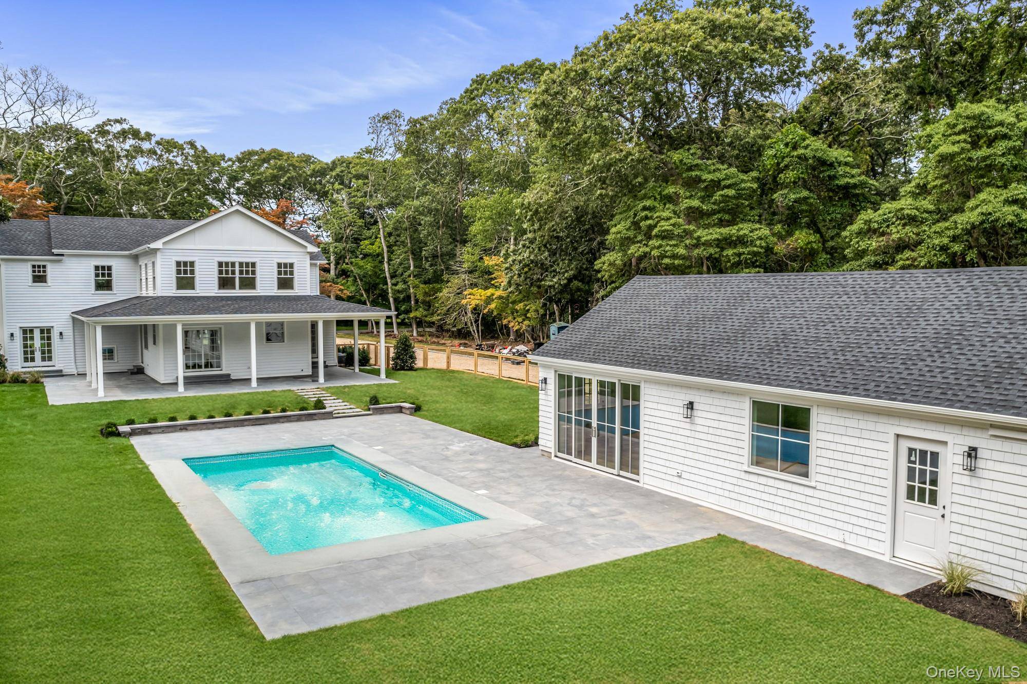 Jagger Lane, steeped in history, presents a modern echo of timeless design at 36 Jagger Lane, Westhampton.