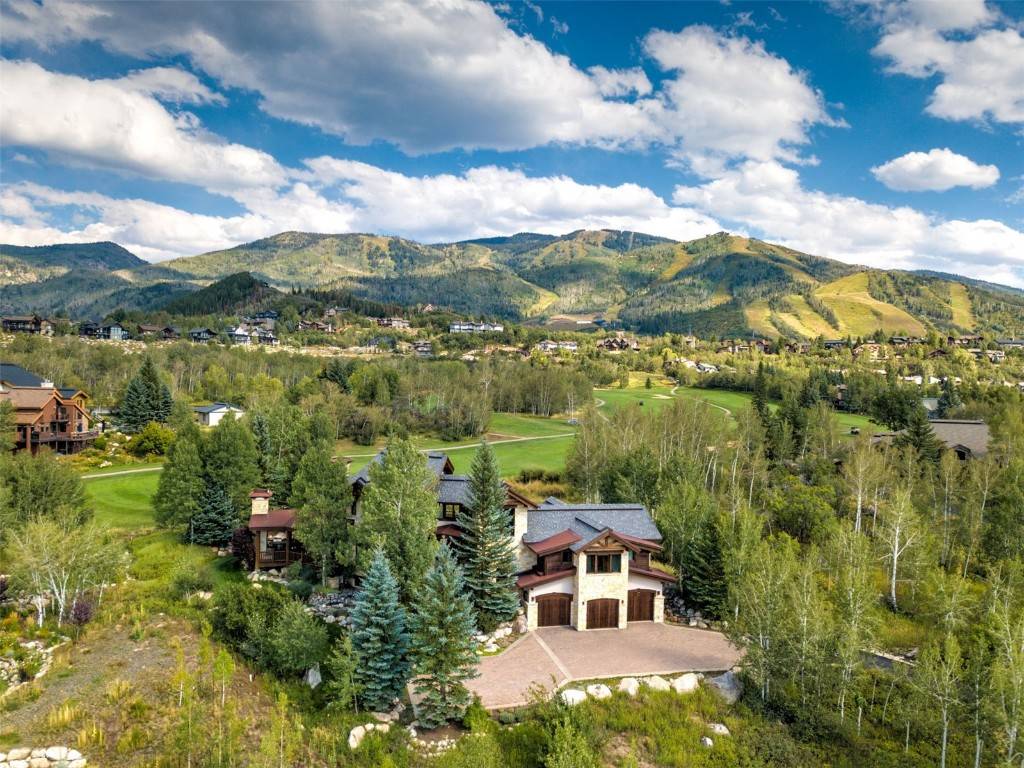 Nestled on a quiet cul de sac in the desirable Sanctuary neighborhood, this exceptional home sits on the Rollingstone Ranch Golf Course with the iconic Steamboat Ski Area as your ...