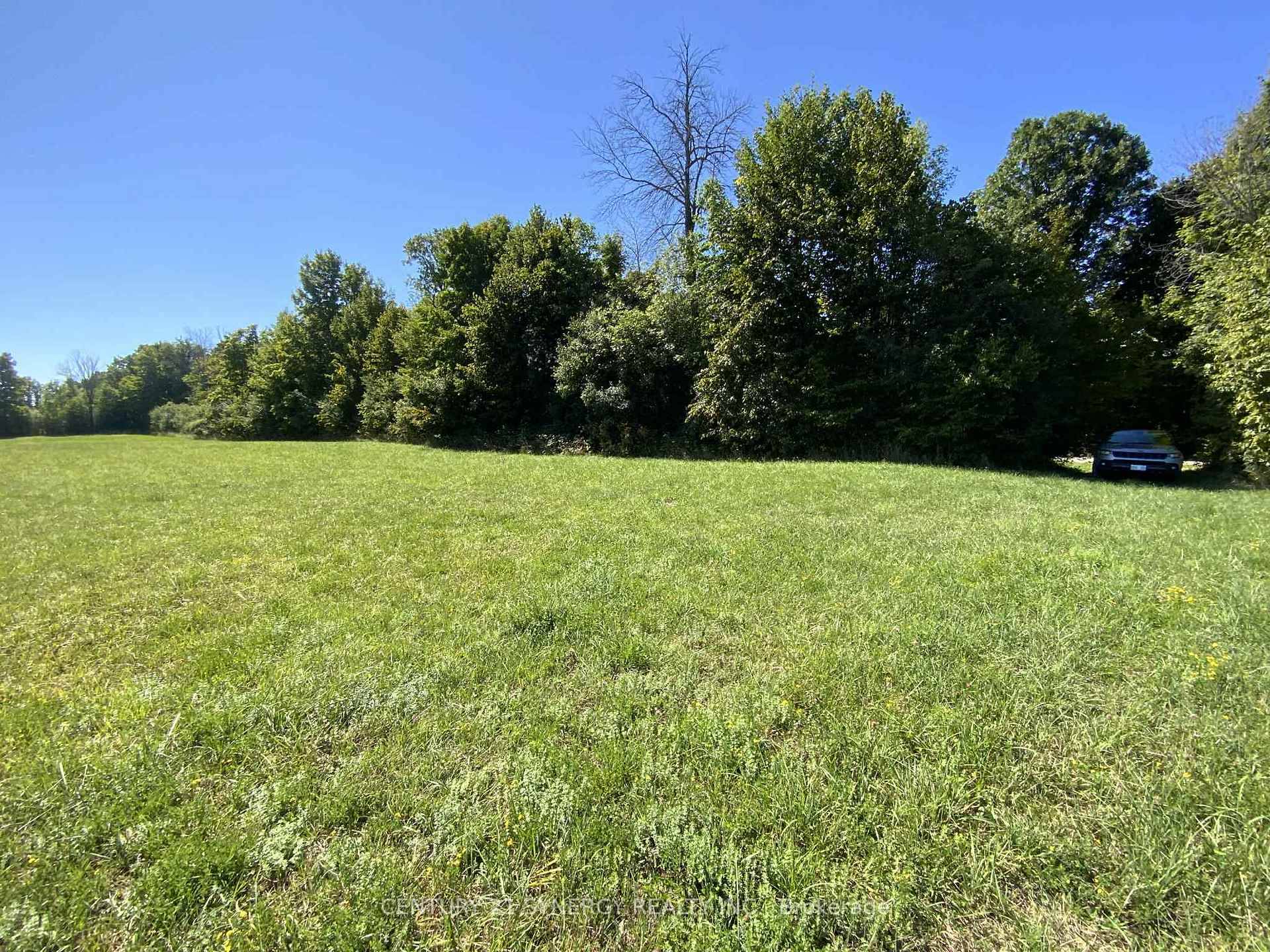 Discover the perfect balance of serenity and convenience with this picturesque 3 acre building lot, located on a quiet, tree lined country road.